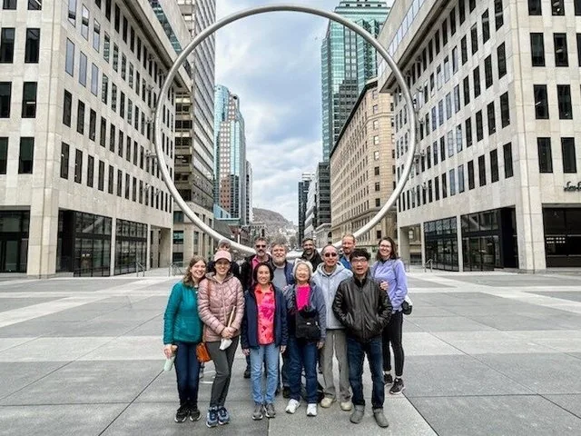 Group posing at The Ring installation in downtown Montreal