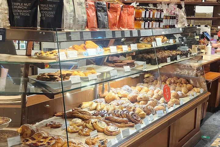 Bakery display case filled with pastries and baked goods