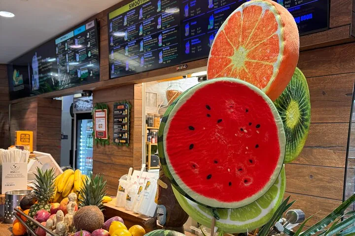 Juice bar counter with large fruit slice decorations